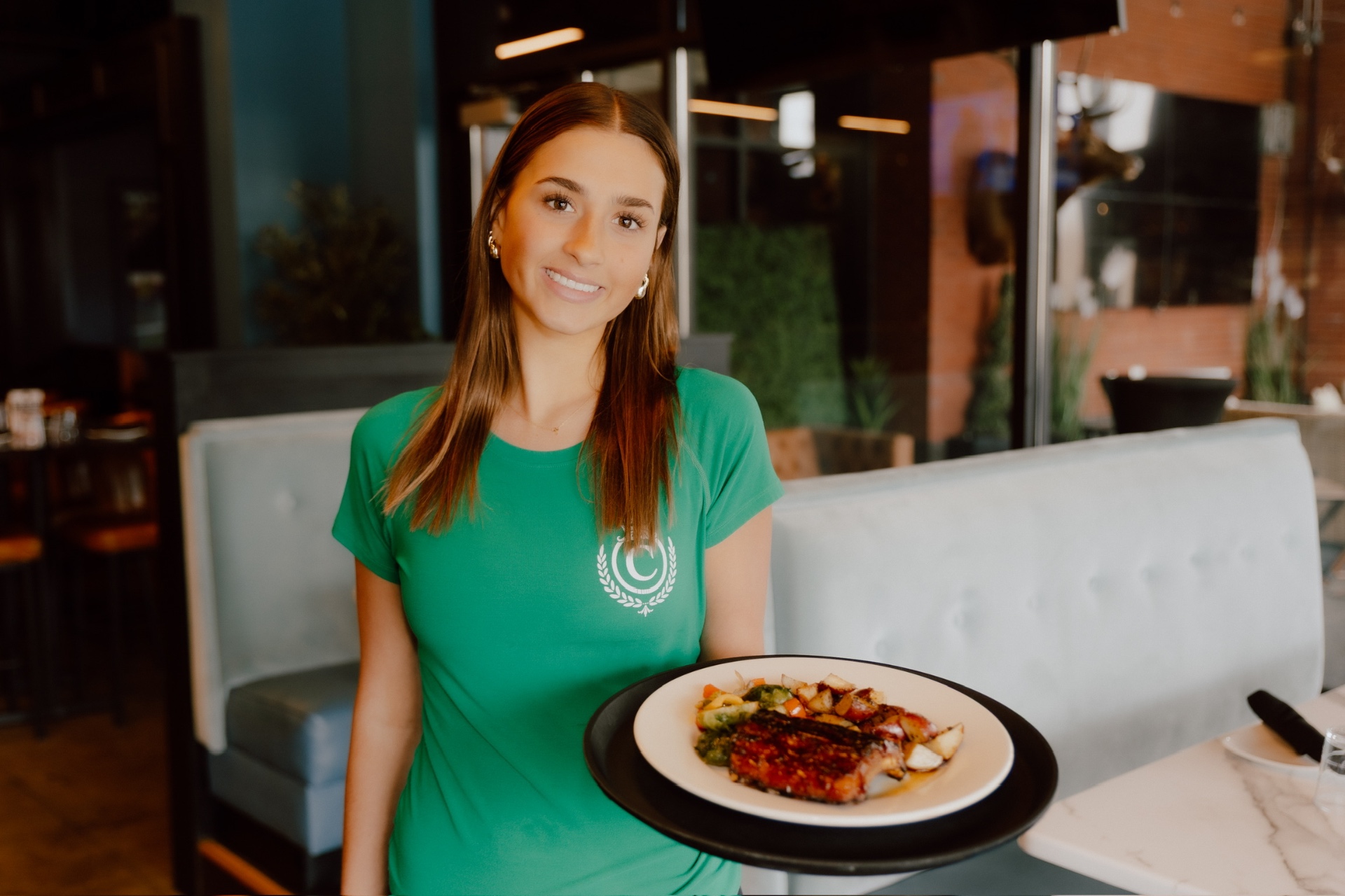 Slow-cooked ribs from the Clubhouse Lounge + Kitchen menu
