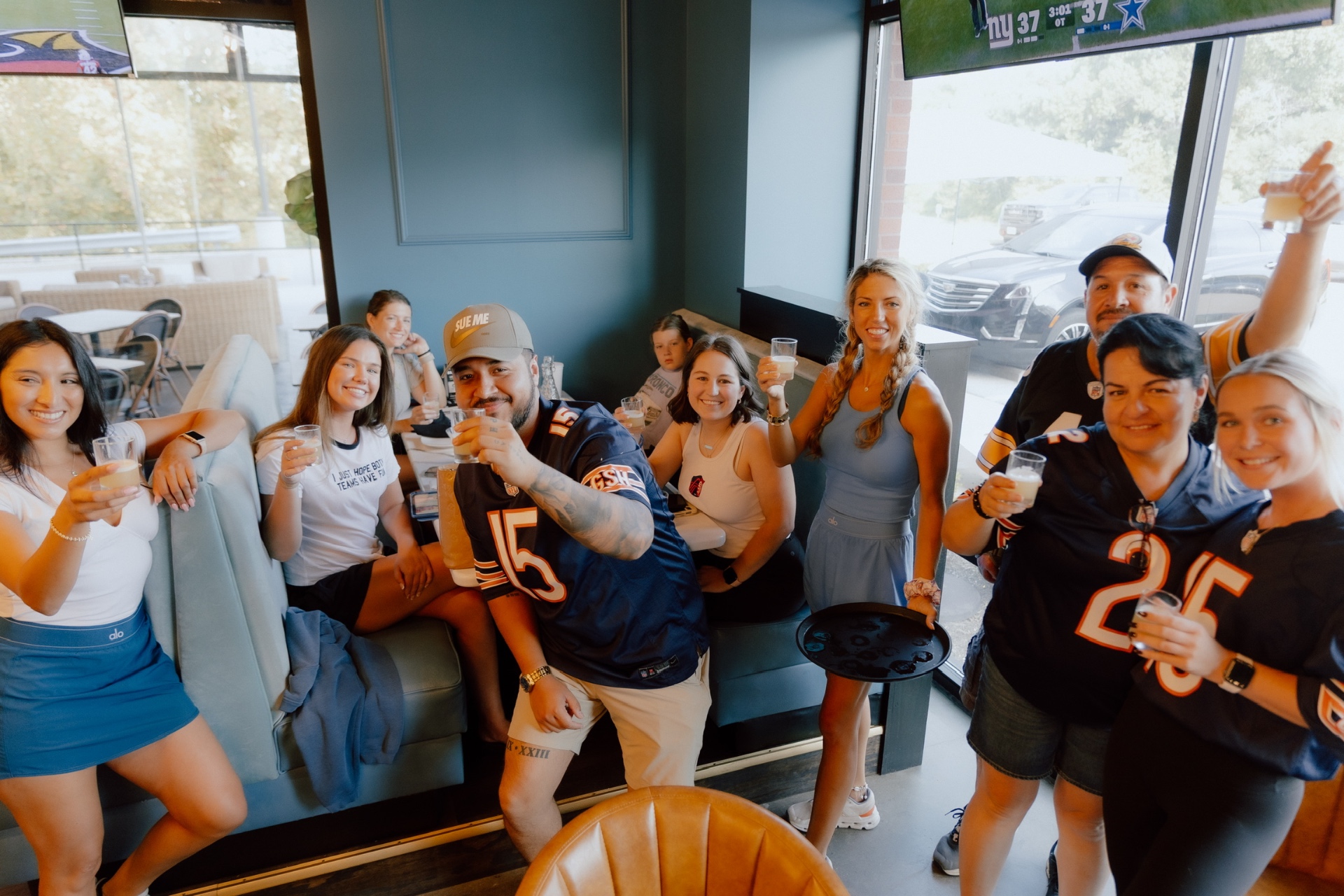 Sports fans watching the game at Clubhouse Lounge + Kitchen Edwardsville