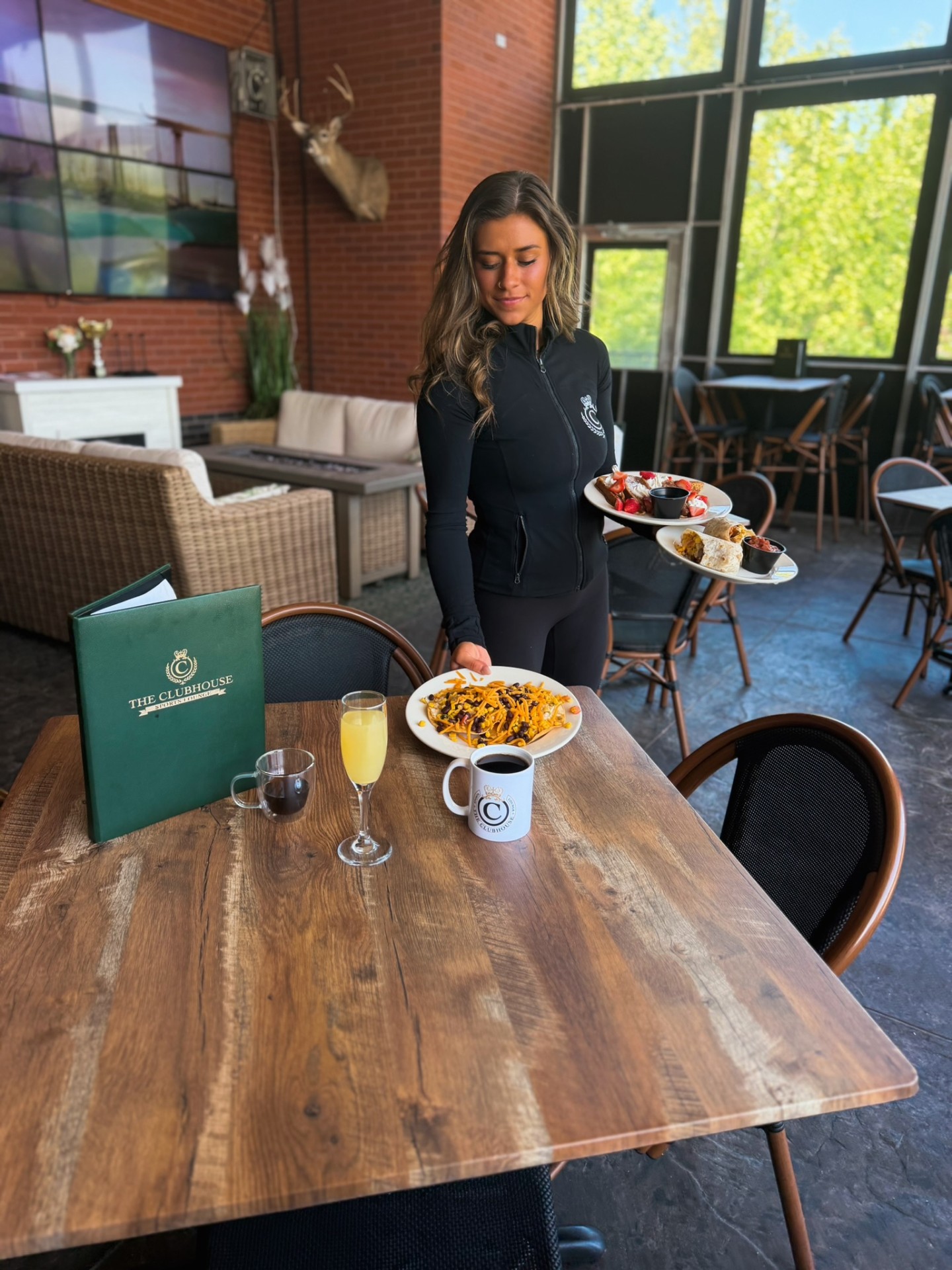 Chicken and waffles brunch plate at Clubhouse Lounge + Kitchen