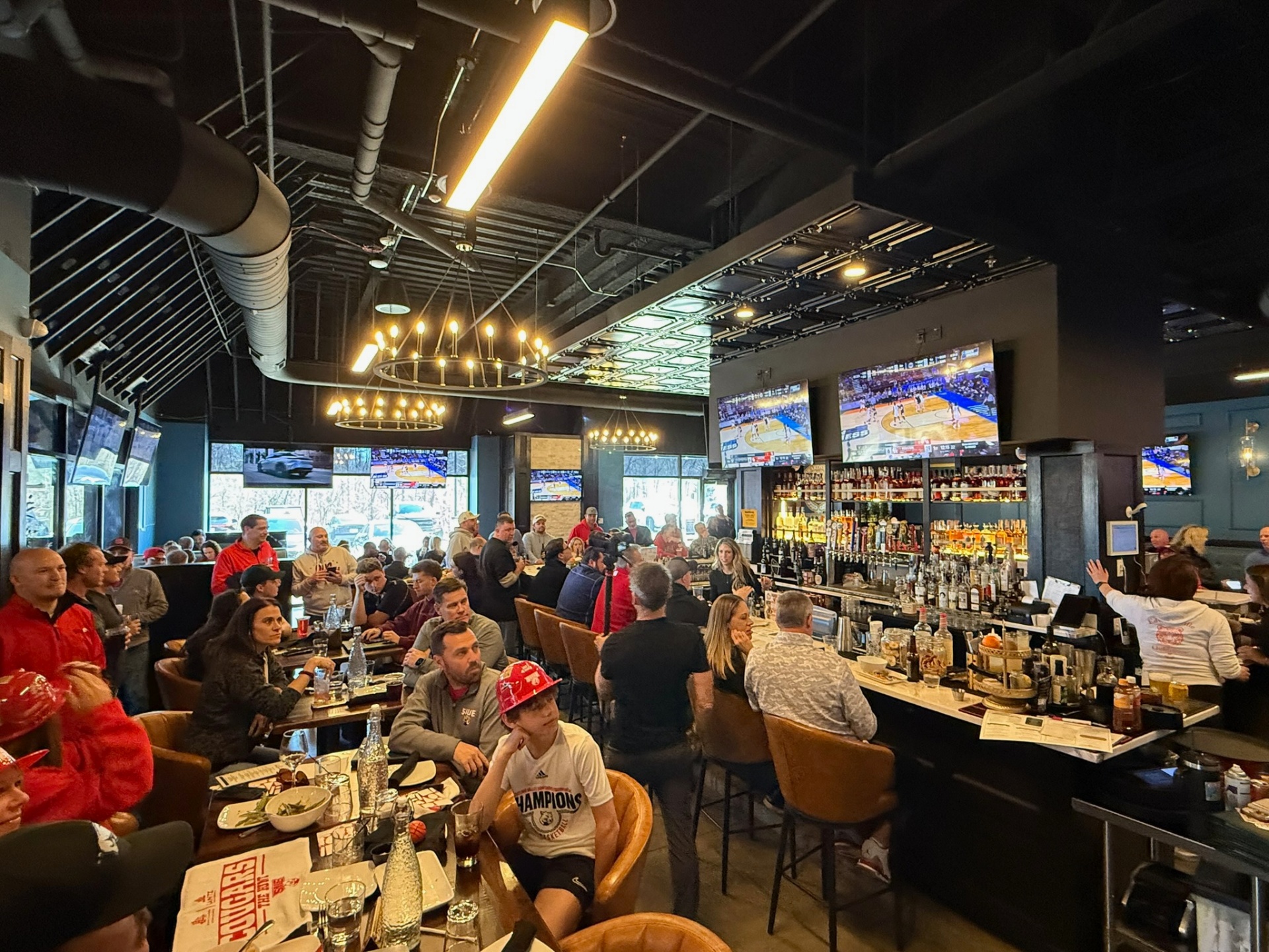 Packed Clubhouse bar during an SIUE basketball watch party